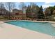 Sparkling community pool surrounded by manicured landscaping, offering a refreshing escape and recreational space at 5975 Vista Brook Dr, Suwanee, GA 30024