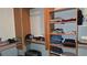 Organized walk-in closet with shelving and rods for ample storage of clothes and accessories at 855 Peachtree Ne St # 2309, Atlanta, GA 30308