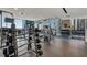 Well-equipped fitness center with weights, weight machines, and views of the city at 855 Peachtree Ne St # 2309, Atlanta, GA 30308