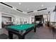 Game room with a billiard table and lounge seating at 855 Peachtree Ne St # 2309, Atlanta, GA 30308