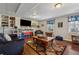 Finished basement with built-in shelving, entertainment area, and unique decor at 1061 Steeple Run, Lawrenceville, GA 30043