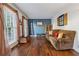 Inviting living room showcasing hardwood flooring, natural light, and stylish accents at 1061 Steeple Run, Lawrenceville, GA 30043