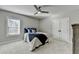 Cozy bedroom with soft carpet, ample natural light, a queen size bed, and good storage at 1431 Torrington Dr, Auburn, GA 30011