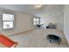 Expansive bonus room with neutral carpet, natural light, and space for recreation at 1431 Torrington Dr, Auburn, GA 30011