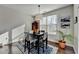 Bright breakfast nook with a dining table next to a window with natural light and nice decor at 1431 Torrington Dr, Auburn, GA 30011