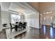 Elegant dining room featuring hardwood floors, wainscoting, and a chandelier at 1431 Torrington Dr, Auburn, GA 30011