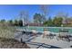 Community pool area featuring lounge chairs for relaxing and soaking up the sun on warm days at 1431 Torrington Dr, Auburn, GA 30011