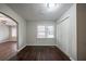 This bedroom has hardwood floors, white walls, a window, and a closet for ample storage space at 1770 Lynn Ln, Decatur, GA 30032