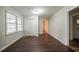 This bedroom boasts hardwood floors, a window, closet, and neutral walls, creating a cozy retreat at 1770 Lynn Ln, Decatur, GA 30032