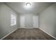 Bedroom with carpet and neutral walls and closet space at 1770 Lynn Ln, Decatur, GA 30032
