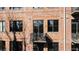 Brick exterior with black window frames and balcony at 3235 Roswell Ne Rd # 710, Atlanta, GA 30305
