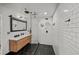 Modern bathroom featuring a glass-enclosed shower and sleek vanity at 3235 Roswell Ne Rd # 710, Atlanta, GA 30305