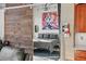 Bedroom with a rustic sliding barn door, industrial accents, and stylish decor at 3235 Roswell Ne Rd # 710, Atlanta, GA 30305