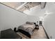 Compact bedroom featuring industrial ceiling detail and modern decor at 3235 Roswell Ne Rd # 710, Atlanta, GA 30305