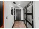 Hallway with a sliding glass door to the right and a contrasting color scheme at 3235 Roswell Ne Rd # 710, Atlanta, GA 30305