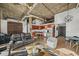 Open concept living room featuring exposed ductwork, a modern kitchen and comfortable seating perfect for entertaining at 3235 Roswell Ne Rd # 710, Atlanta, GA 30305