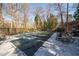 Outdoor pool surrounded by lounge chairs and trees at 3235 Roswell Ne Rd # 710, Atlanta, GA 30305