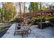 Relaxing poolside lounge area with sunbeds, outdoor kitchen, and a covered dining area for outdoor enjoyment at 3235 Roswell Ne Rd # 710, Atlanta, GA 30305