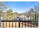 Outdoor balcony provides a scenic vista of trees and the home's surroundings, enhancing outdoor living at 10 Colony Ridge Dr, Alpharetta, GA 30022