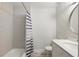 Neutrally designed bathroom with shower/tub, textured walls and single sink vanity offering functional simplicity at 10 Colony Ridge Dr, Alpharetta, GA 30022