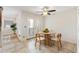 Bright breakfast nook featuring a ceiling fan, a round table and tiled floors at 10 Colony Ridge Dr, Alpharetta, GA 30022