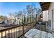 Spacious deck with seating area overlooking a lush backyard with mature trees, perfect for outdoor entertaining at 10 Colony Ridge Dr, Alpharetta, GA 30022