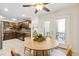 Bright kitchen featuring stainless appliances, wood cabinets, and a breakfast nook at 10 Colony Ridge Dr, Alpharetta, GA 30022