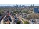 Aerial view of the property with a city skyline backdrop in a neighborhood setting at 1029 Fairway Ne Ests, Atlanta, GA 30319
