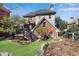 Beautiful backyard with a spacious deck perfect for entertaining, complemented by a well-maintained lawn and garden at 1029 Fairway Ne Ests, Atlanta, GA 30319