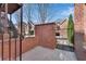 Brick walled courtyard with stair access to upper level at 1029 Fairway Ne Ests, Atlanta, GA 30319