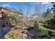 Inviting backyard featuring a charming garden, stone-lined pathway, and mature trees, creating a tranquil environment at 1029 Fairway Ne Ests, Atlanta, GA 30319