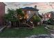 Backyard featuring a spacious lawn, elevated deck, and lush landscaping with mature trees at 1029 Fairway Ne Ests, Atlanta, GA 30319