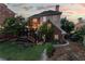 Backyard featuring a spacious lawn, elevated deck, and lush landscaping with mature trees at 1029 Fairway Ne Ests, Atlanta, GA 30319