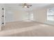 Spacious bedroom features carpet flooring and white trim throughout at 1029 Fairway Ne Ests, Atlanta, GA 30319