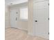 Bright bedroom featuring neutral carpet, a shuttered window and neutral wall color at 1029 Fairway Ne Ests, Atlanta, GA 30319