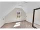 Cozy bedroom with neutral carpet, natural light, and large mirror at 1029 Fairway Ne Ests, Atlanta, GA 30319