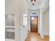 The entryway features hardwood floors, white molding, and an elevator in the wall on the left at 1029 Fairway Ne Ests, Atlanta, GA 30319