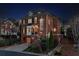 Charming brick home at night highlighting its beautiful architecture, well-lit entrance, and inviting ambiance at 1029 Fairway Ne Ests, Atlanta, GA 30319