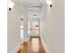 Hallway with hardwood floors, white trim, and natural light at 1029 Fairway Ne Ests, Atlanta, GA 30319