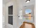 Hallway with hardwood floors, white trim, and natural light at 1029 Fairway Ne Ests, Atlanta, GA 30319