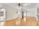 Large open room with hardwood floors and bright light through windows at 1029 Fairway Ne Ests, Atlanta, GA 30319