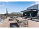 Enjoy this expansive rooftop deck with lounge seating, dining tables, and city views, perfect for entertaining guests at 1029 Fairway Ne Ests, Atlanta, GA 30319