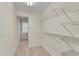 Walk-in closet with carpeted flooring and wire shelving at 1029 Fairway Ne Ests, Atlanta, GA 30319