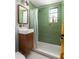 Stylish bathroom with green tile and modern fixtures at 1190 Briarcliff Ne Rd # 1, Atlanta, GA 30306