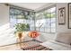 Bedroom view featuring corner windows and a comfy-looking orange chair at 1190 Briarcliff Ne Rd # 1, Atlanta, GA 30306