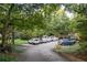 Well-maintained parking lot surrounded by lush greenery and mature trees, providing a serene environment at 1190 Briarcliff Ne Rd # 1, Atlanta, GA 30306