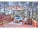 Inviting back deck featuring outdoor furniture, fire pit, and large cantilevered umbrella at 2515 Oak Quarters, Smyrna, GA 30080