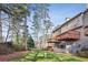 Townhome boasts a spacious backyard with multiple decks, providing ample outdoor enjoyment at 2515 Oak Quarters, Smyrna, GA 30080