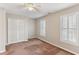 Spacious bedroom featuring a ceiling fan, plantation shutters and double door closet at 2515 Oak Quarters, Smyrna, GA 30080