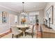 Formal dining room with hardwood floors, decorative chandelier, and an abundance of natural light at 2515 Oak Quarters, Smyrna, GA 30080